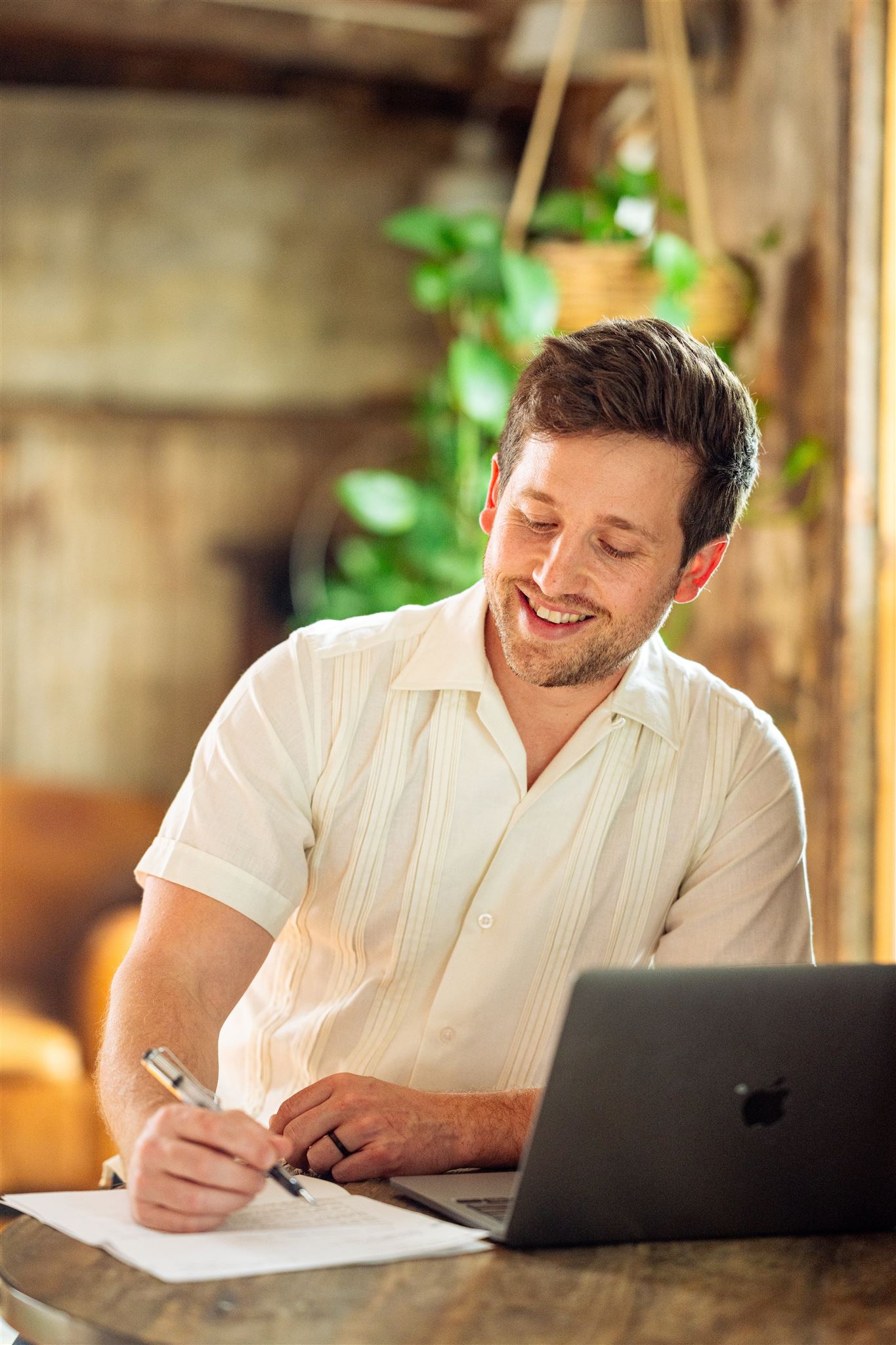 Zac working at his desk